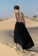 Load image into Gallery viewer, Drop Back Asymmetric Maxi Dress in Black