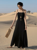 Load image into Gallery viewer, Drop Back Asymmetric Maxi Dress in Black
