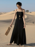Load image into Gallery viewer, Drop Back Asymmetric Maxi Dress in Black