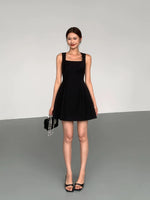 Load image into Gallery viewer, Sleeveless Mini Tulip Dress in Black
