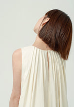 Load image into Gallery viewer, Sleeveless Pocket Bubble Dress in Cream