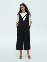 Load image into Gallery viewer, Asymmetric Sleeveless Midi Pocket Jumpsuit in Black