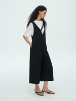 Load image into Gallery viewer, Asymmetric Sleeveless Midi Pocket Jumpsuit in Black