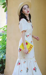 Load image into Gallery viewer, Floral Flute Hem Maxi Dress in Cream