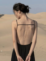 Load image into Gallery viewer, Drop Back Asymmetric Maxi Dress in Black