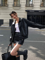 Load image into Gallery viewer, Buttery Soft Mini Faux Leather Skirt in Black