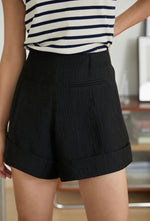 Load image into Gallery viewer, Tencel Blend Crepe Cuff Shorts in Black