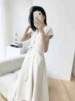 Load image into Gallery viewer, Flutter Pocket Midi Dress in Cream