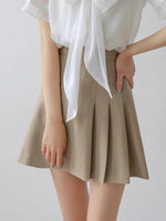 Load image into Gallery viewer, Pleated Flare Mini Skirt in Beige
