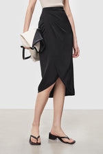 Load image into Gallery viewer, Asymmetric Wrap Skirt in Black
