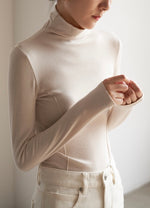 Load image into Gallery viewer, Side Line Turtleneck Top in Cream
