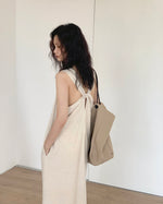 Load image into Gallery viewer, Twist Back Pocket Maxi Dress in Off White
