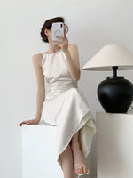 Load image into Gallery viewer, Gathered Flute Hem Dress in Cream
