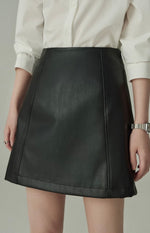 Load image into Gallery viewer, Faux Leather Mini Skirt in Black
