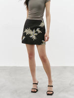 Load image into Gallery viewer, Tencel Blend Floral Embroidered Mini Skirt in Black
