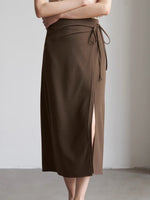 Load image into Gallery viewer, Midi Wrap Tie Slit Skirt in Brown
