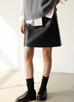 Load image into Gallery viewer, Faux Leather Mid Skirt in Black

