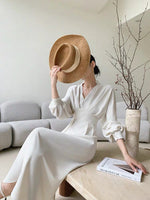 Load image into Gallery viewer, Empire Long Sleeve Midi Dress in Cream
