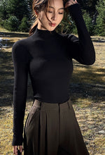 Load image into Gallery viewer, Ribbed Panel High Neck Top in Black

