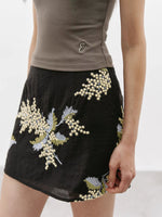 Load image into Gallery viewer, Tencel Blend Floral Embroidered Mini Skirt in Black
