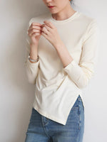 Load image into Gallery viewer, Long Sleeve Asymmetric Hem Top in Cream
