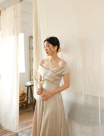 Load image into Gallery viewer, Off Shoulder Pleat Maxi Dress in Champagne
