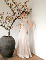 Load image into Gallery viewer, Slit Pocket Maxi Cheongsam Dress in Champagne
