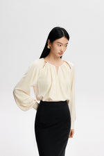 Load image into Gallery viewer, Cutout Tie Long Sleeve Top in Cream

