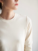 Load image into Gallery viewer, Long Sleeve Asymmetric Hem Top in Cream

