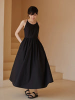 Load image into Gallery viewer, Cross Back Pocket Maxi Dress in Black
