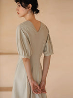 Load image into Gallery viewer, Blouson Pleat Tailored Dress in Greige
