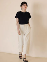 Load image into Gallery viewer, Tapered Cropped Line Trousers in Cream
