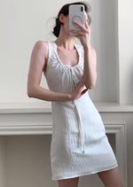 Load and play video in Gallery viewer, Tencel Blend Textured Mini Dress in White
