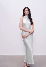 Load and play video in Gallery viewer, Satin Drop Back Tie Halter Dress in Green
