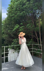 Load and play video in Gallery viewer, Tencel Eyelet Empire Maxi Dress in Cream
