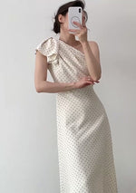 Load and play video in Gallery viewer, Toga Bow Polka Dress in Cream
