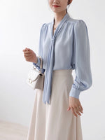 Load image into Gallery viewer, Tie Neck Long Sleeve Blouse in Blue
