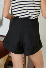 Load image into Gallery viewer, Tencel Blend Crepe Cuff Shorts in Black
