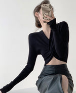 Load image into Gallery viewer, Ciudad Twist Cropped Long Sleeve Knit Top in Black
