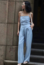 Load image into Gallery viewer, Tencel Blend Halter Pocket Maxi Jumpsuit in Blue

