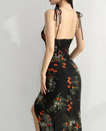 Load image into Gallery viewer, Twilight Floral Wrap Tie Strap Slit Dress in Black
