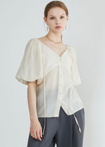 Load image into Gallery viewer, Tencel Blend Sheer Blouson Button Blouse in Cream
